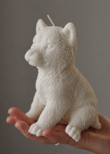 Akita Inu puppy candle close up, sculptural dog candle soy wax